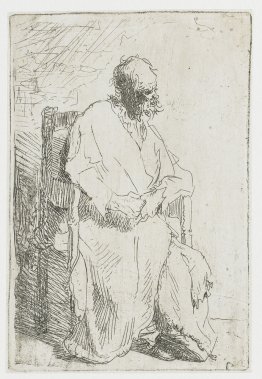 Vieil homme dans un long manteau assis dans un fauteuil