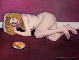 Femme blonde nue avec des mandarines