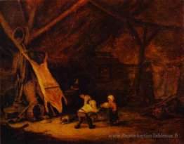 Les enfants jouant dans une grange