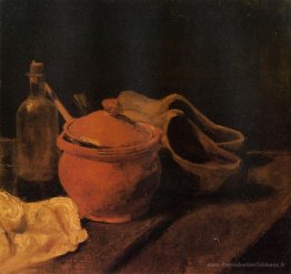 Nature morte avec des logiciels en terre, des bouteilles et des