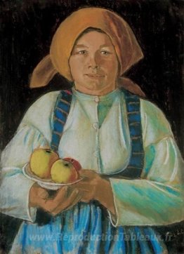 Jeune femme gardant des pommes
