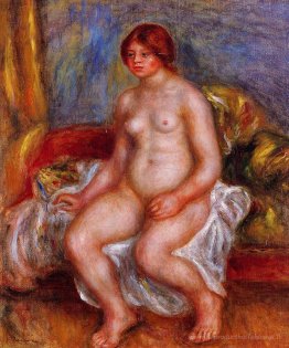 Femme nue sur coussins verts
