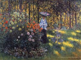 Femme avec un parasol dans le jardin en argenteuil