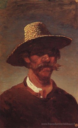 La tête d'un paysan ukrainien dans un chapeau de paille