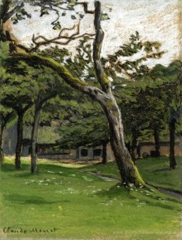 Ferme normande à travers les arbres
