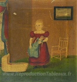 Fille détenant une poupée dans un intérieur