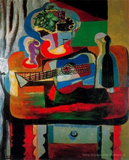 Guitare, bouteille, plat de fruits et verre sur la table