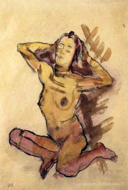 Femelle nue assise sur le sol