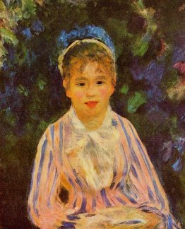 Jeune femme dans une chemise à rayures bleues et roses