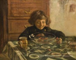 Un enfant assis une table
