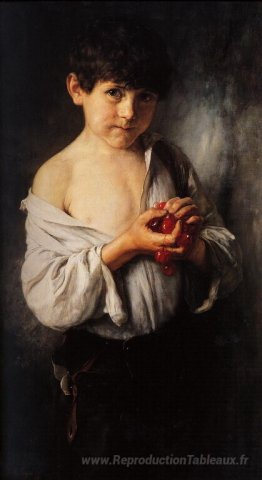 Garçon avec des cerises