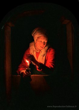 Vieille femme avec une bougie