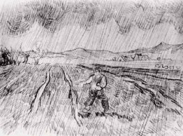 Champ fermé avec un semeur sous la pluie