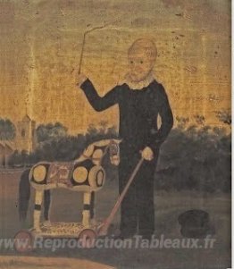 Jeune garçon avec cheval jouet