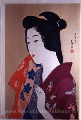 Femme avec une serviette à main