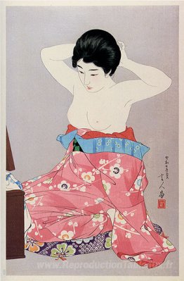 Une femme avant le miroir