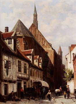 Une rue animée à Brême avec l'église Saint Johann en arrière-pla
