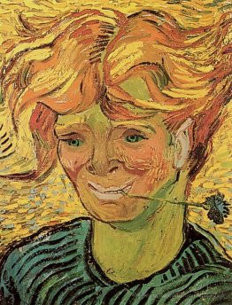 Jeune homme avec une fleur de maïs
