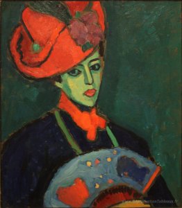 Schokko avec un chapeau rouge