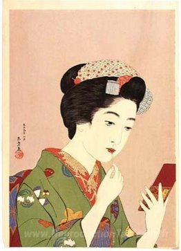 Femme tenant du rouge à lèvres