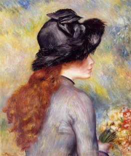 Jeune fille tenant au bouquet de tulipes