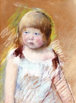 Enfant avec une frange dans une robe bleue