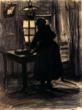 Femme coupant du pain