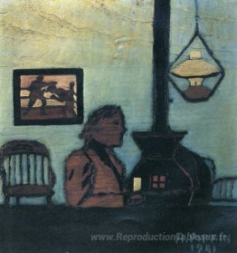 Homme assis près de poêle