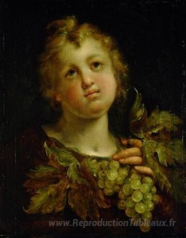 Garçon avec des raisins