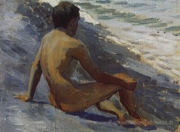 Garçon au bord de la mer