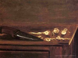 Gousses d'ail et couteau au coin d'une table