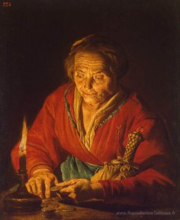 Vieille femme avec une bougie