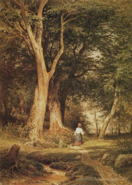 Une femme avec un garçon dans la forêt