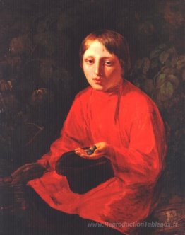 Un garçon dans une chemise rouge