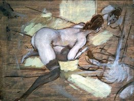 Femme nue allongée sur des coussins jaunes