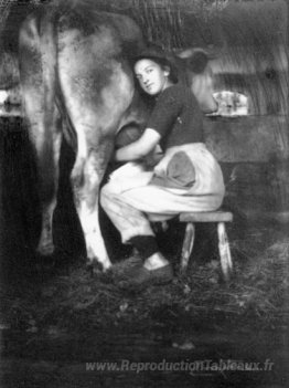 Femme traire vache