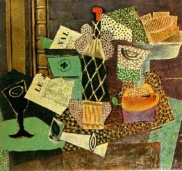 Verre et bouteille de rhum de paille