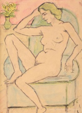 Nu dans une chaise verte