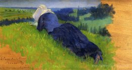 Une paysanne s'est étendue sur l'herbe