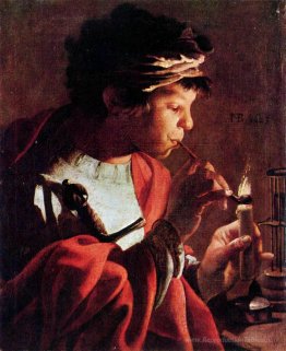Garçon allumant un tuyau