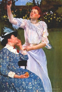 Jeune femme cueille de fruits