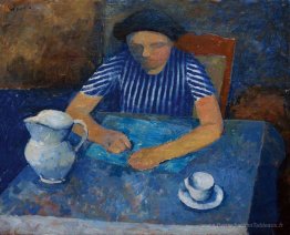 Fille à une table bleue