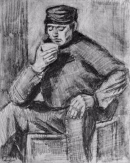 Jeune homme, assis avec une tasse à la main, à moitié longueur