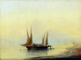 Barge dans le rivage de la mer