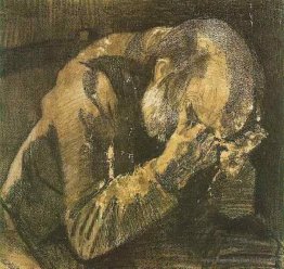Homme avec sa tête dans ses mains