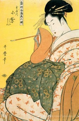 Komurasaki du Tamaya avec un tuyau à la main