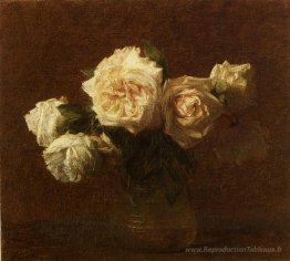 Roses roses jaunes dans un vase en verre