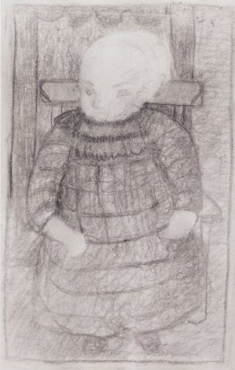 Enfant assis dans un fauteuil