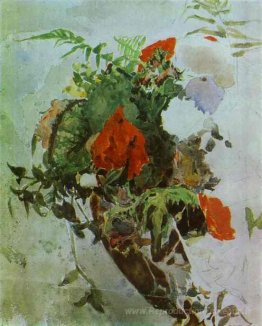 Fleurs rouges et feuilles de bégonia dans un panier