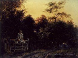 Paysage avec une piste et un homme assis sur une porte